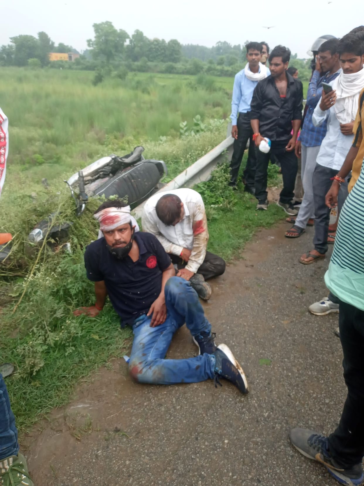 Car and bike fell into ravine after truck collision