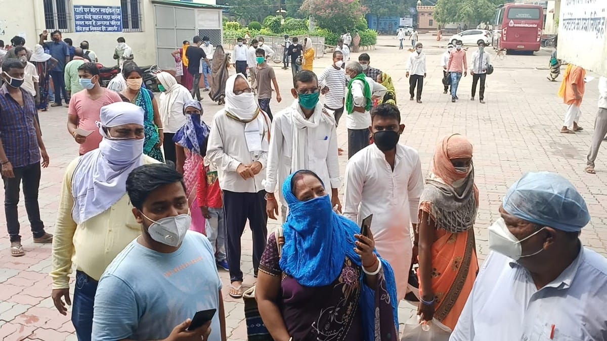 After screening in front of OPD patients enter the hospital