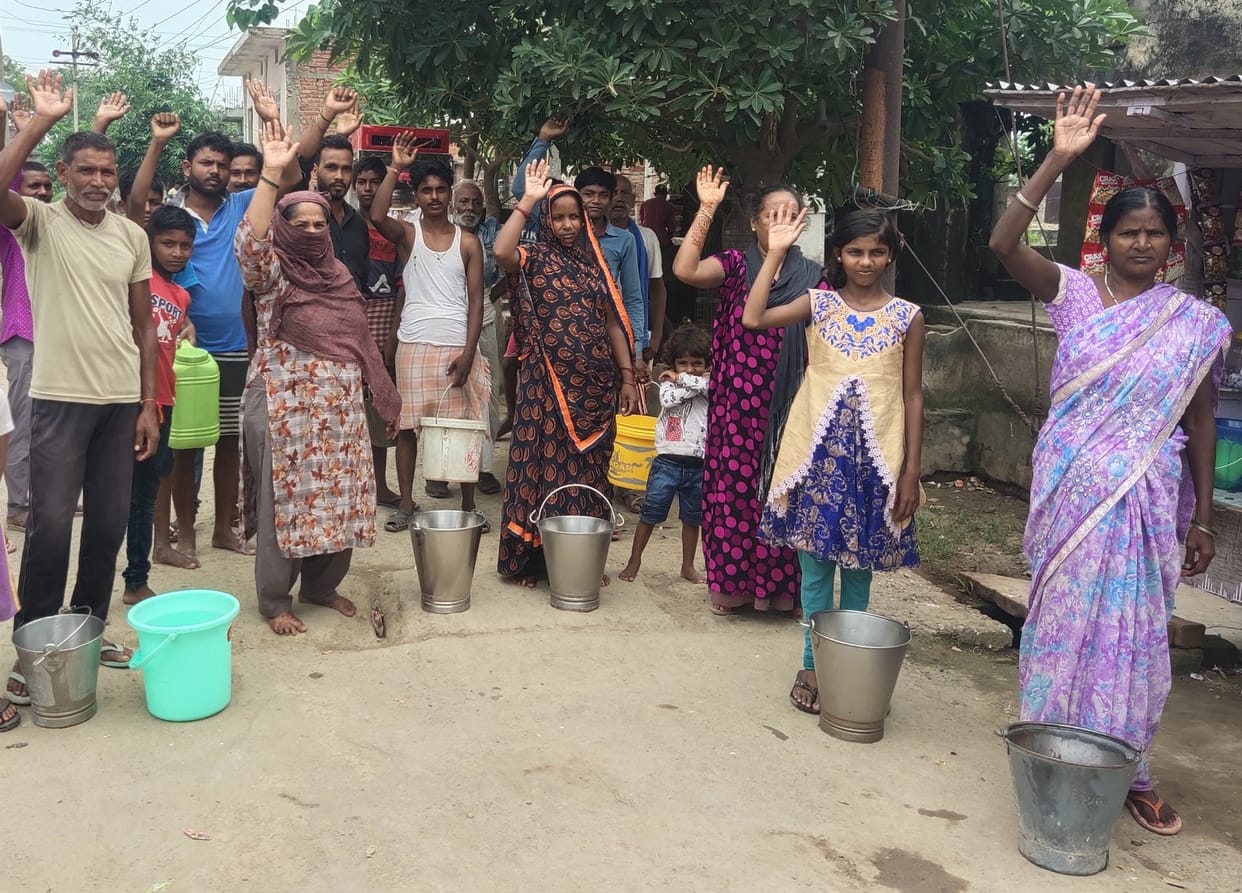 Three hand pumps dependent population of one thousand, people facing  protest