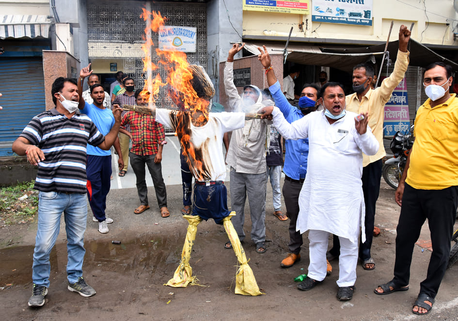 Demand for waiver of fees by burning effigy of school operator
