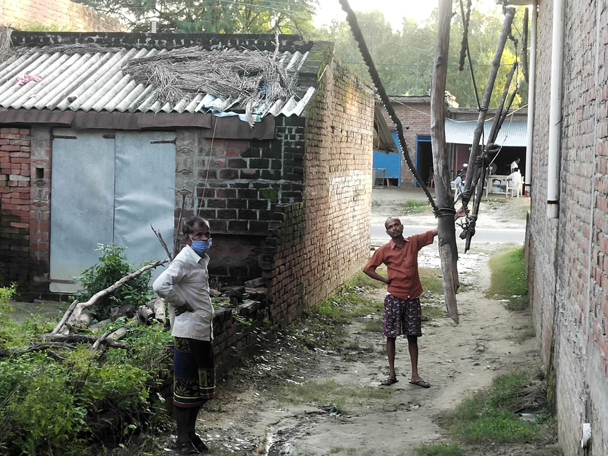 People taking life's dilapidated power line in Sultanpur
