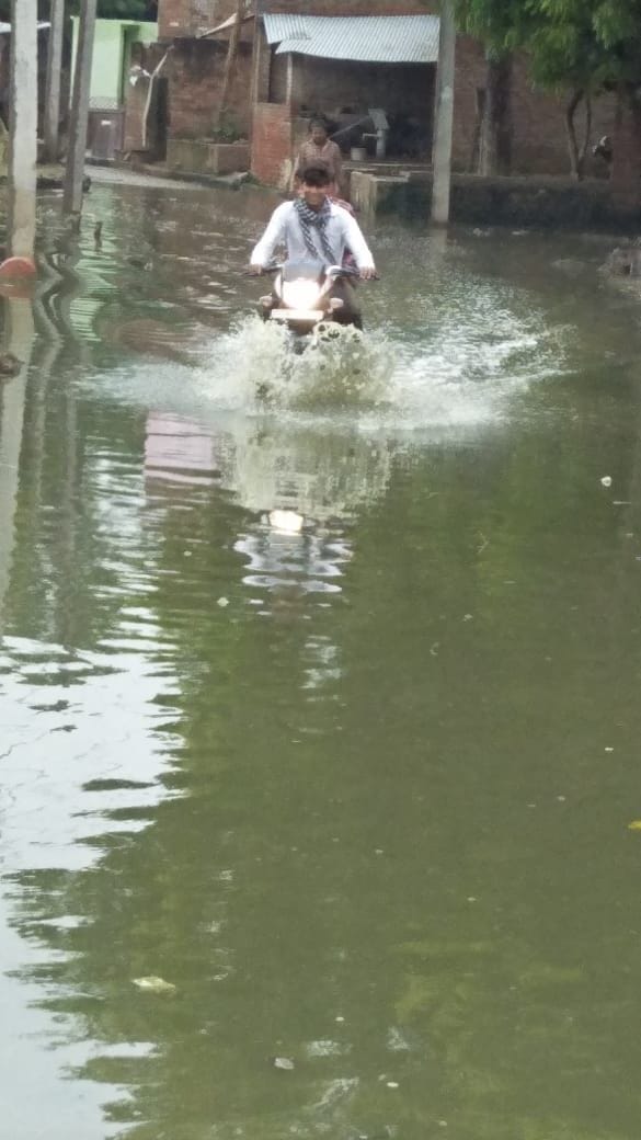 pond overflow ,street jalmagna