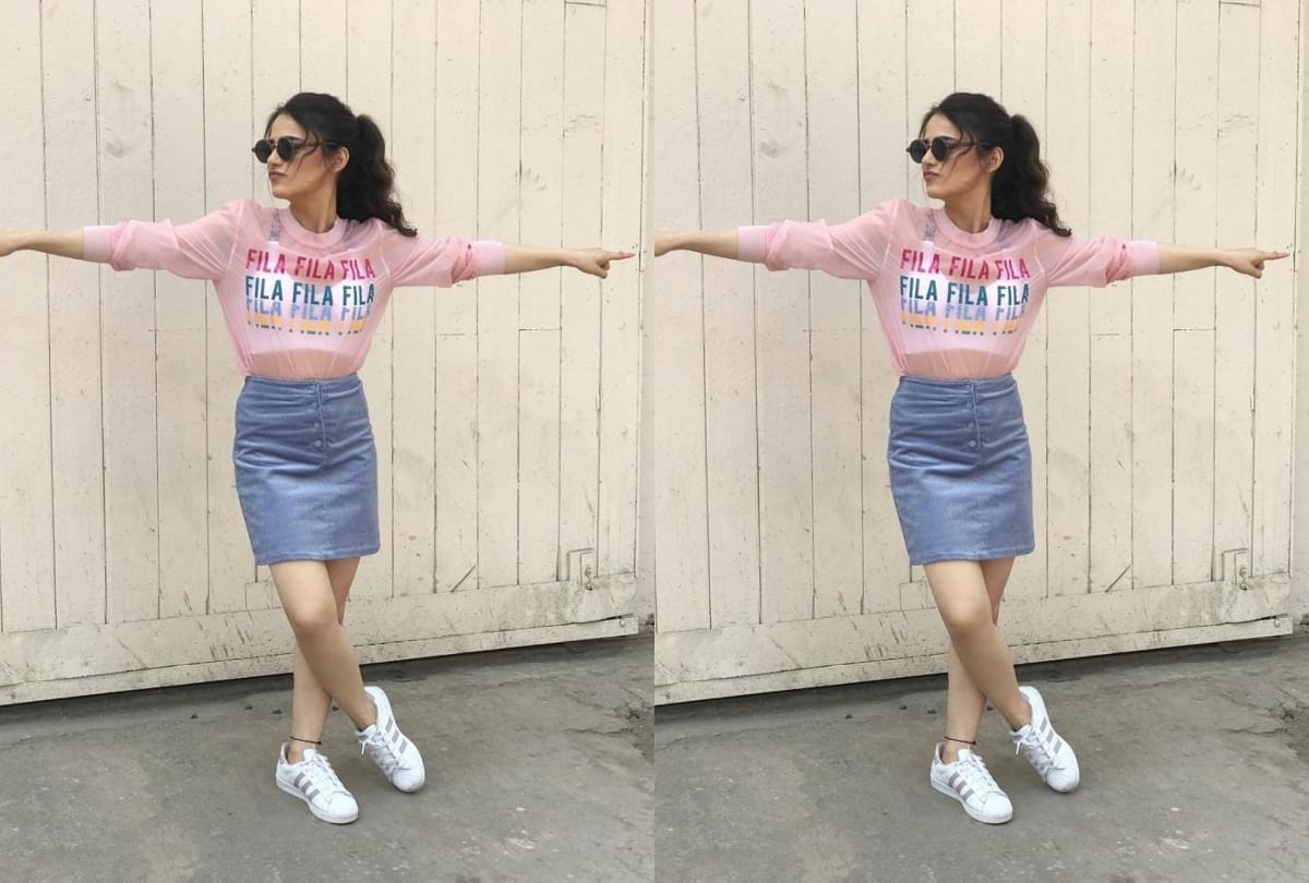 radhika madan mini skirt and sheer sweatshirt look perfect for rainy day