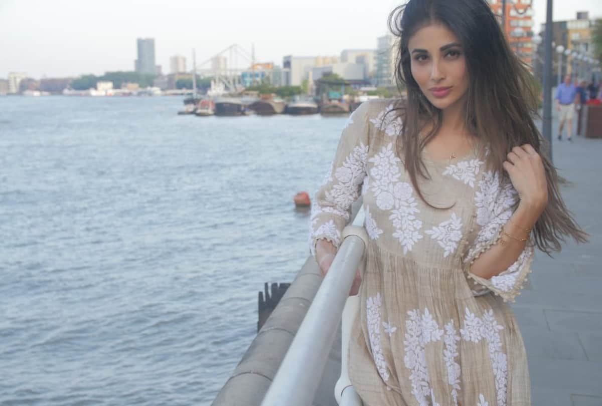 mouni roy shows her curvy body in summer short spaghetti white dress