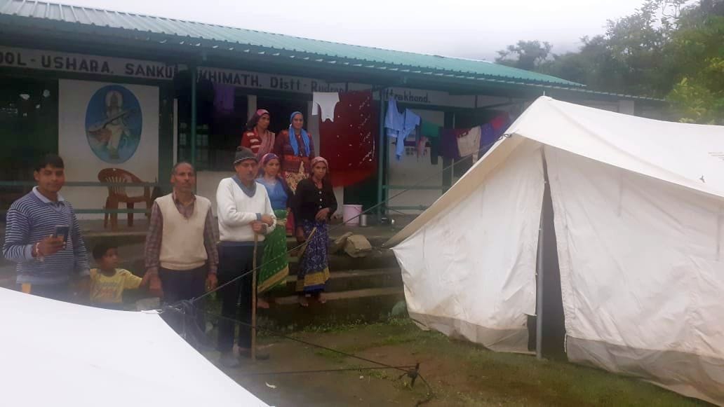 118 families living in cowshed and school