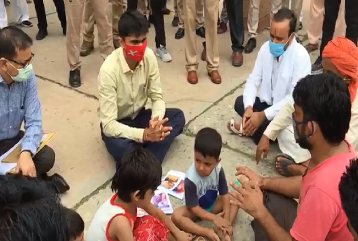 Gautam budh nagar dm suhas ly sat on road and hear complaint of a complainant photos goes viral