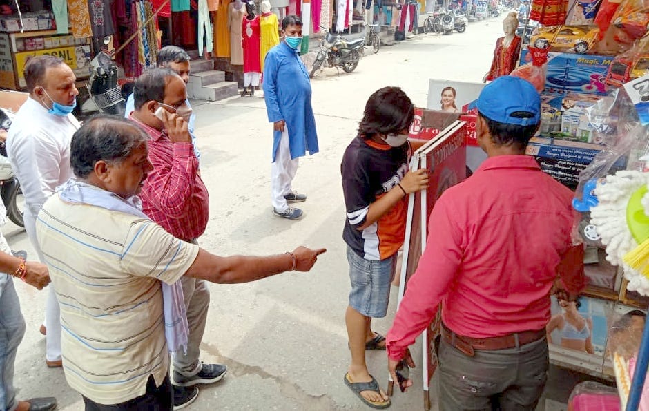 Remove pornographic poster-hoardings from the market