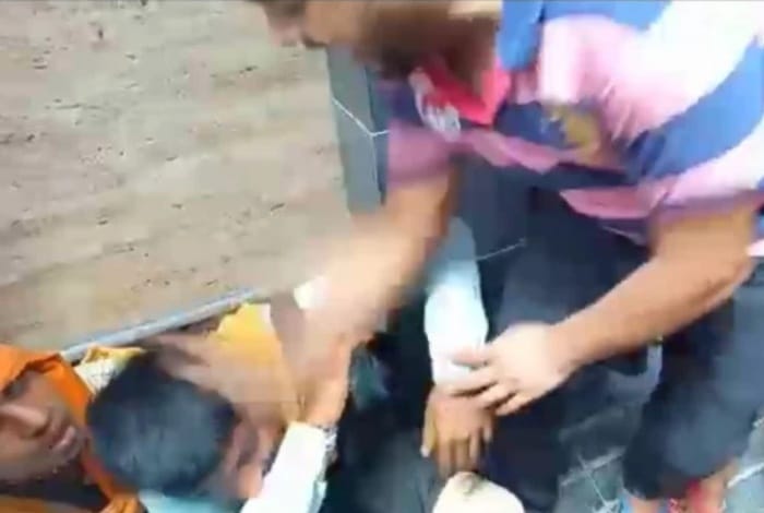 boys were dragging girl child forcefully, people beat the boys and handed over to the police