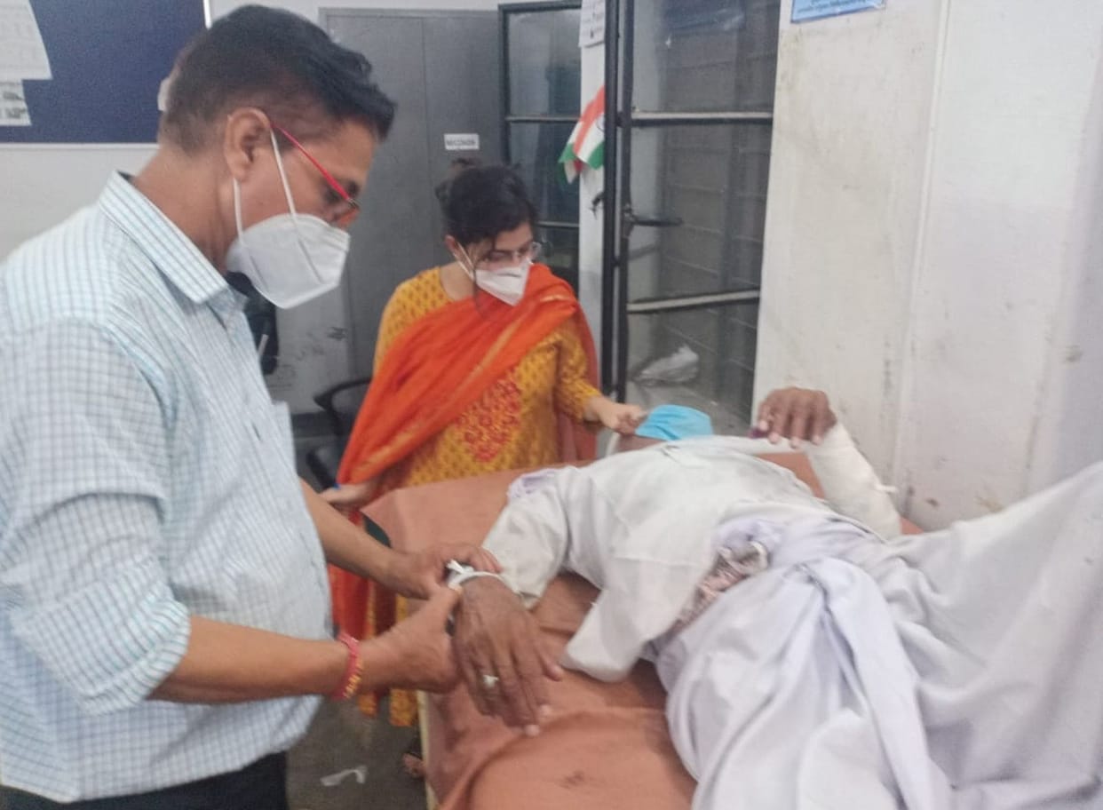 Father and son attacked with sharp weapons