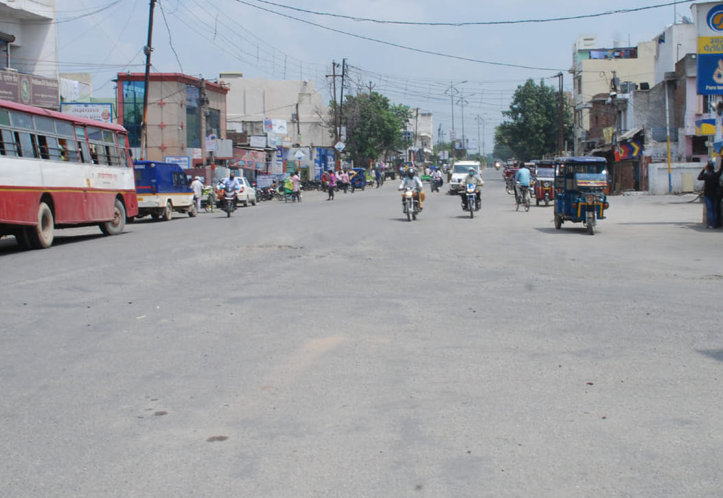 Silence in markets, vehicles running on roads