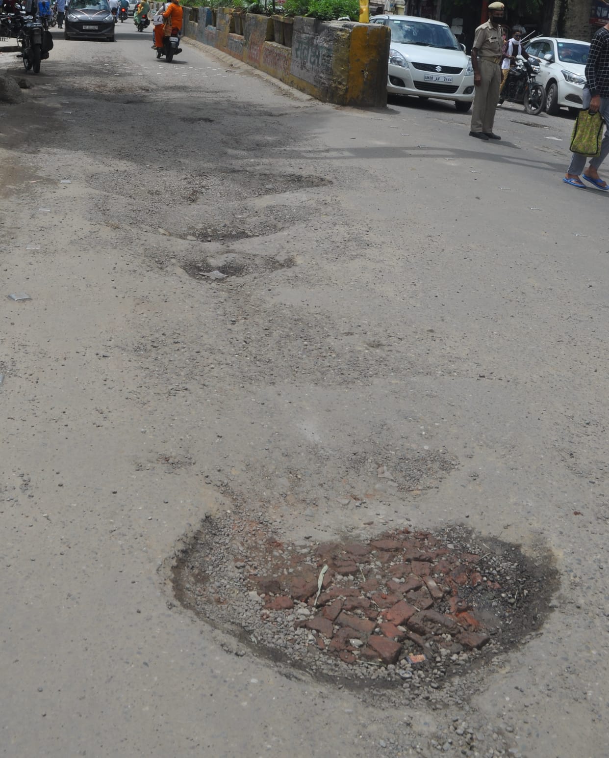 City roads turned into pits