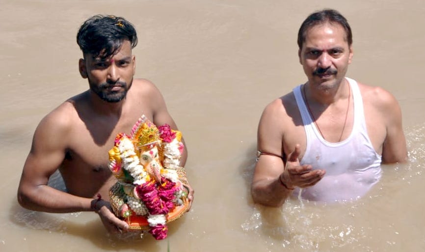 Ganpati idols immersed in the canal