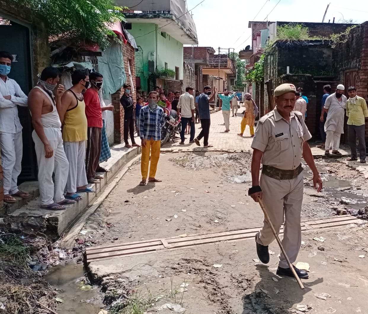 Villagers raging when pond water is filled in slum