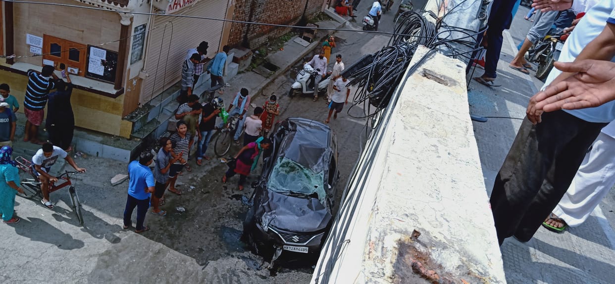 Grill of flyover broke uncontrolled car below 50 feet, three friends saved from airbag opening