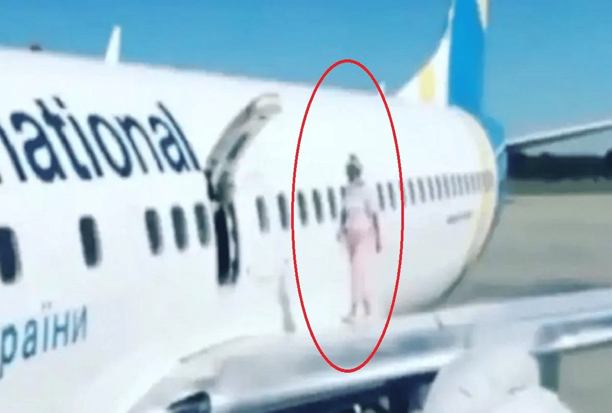 women walked on flight wing after complaining feeling too hot video goes viral