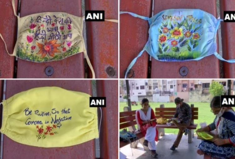 A group of artists and fine arts teachers paints special messages on face masks in Chandigarh
