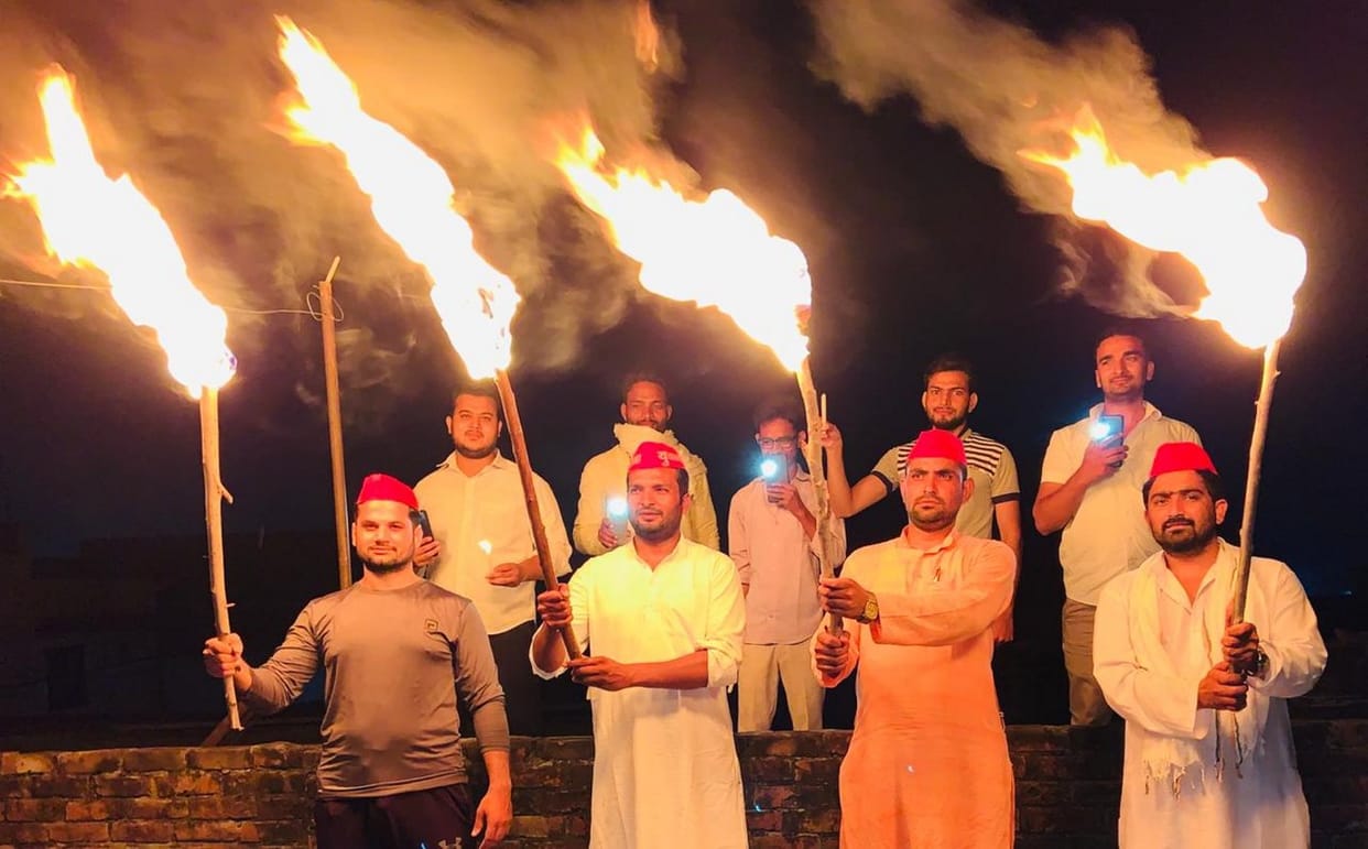 Supporters lit the torch in protest against rising unemployment