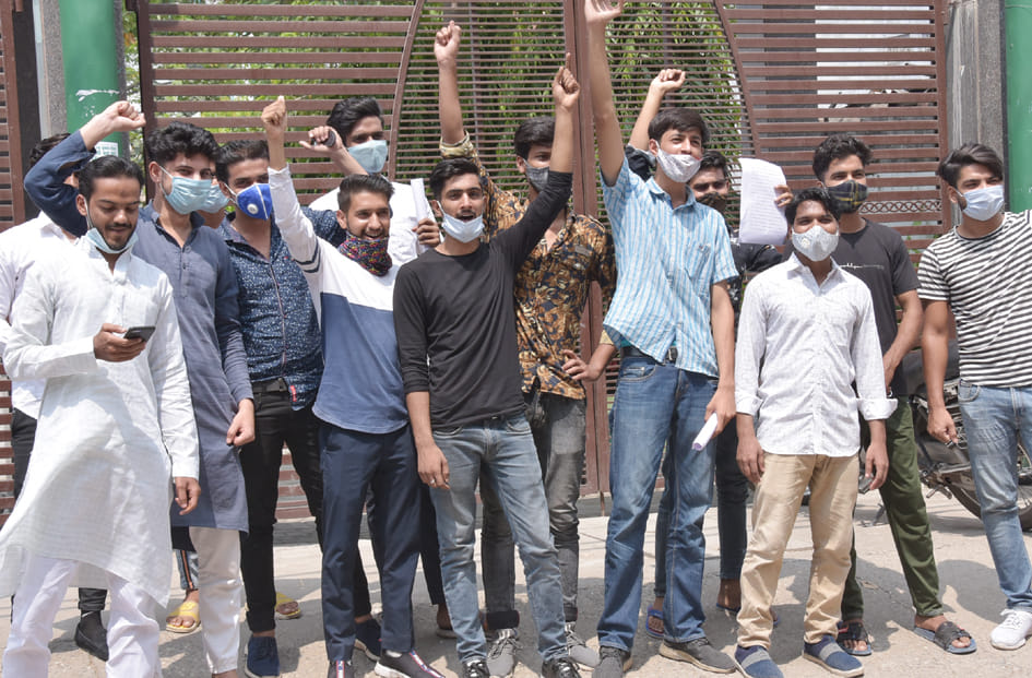 Demonstration against failed students in B.Com.