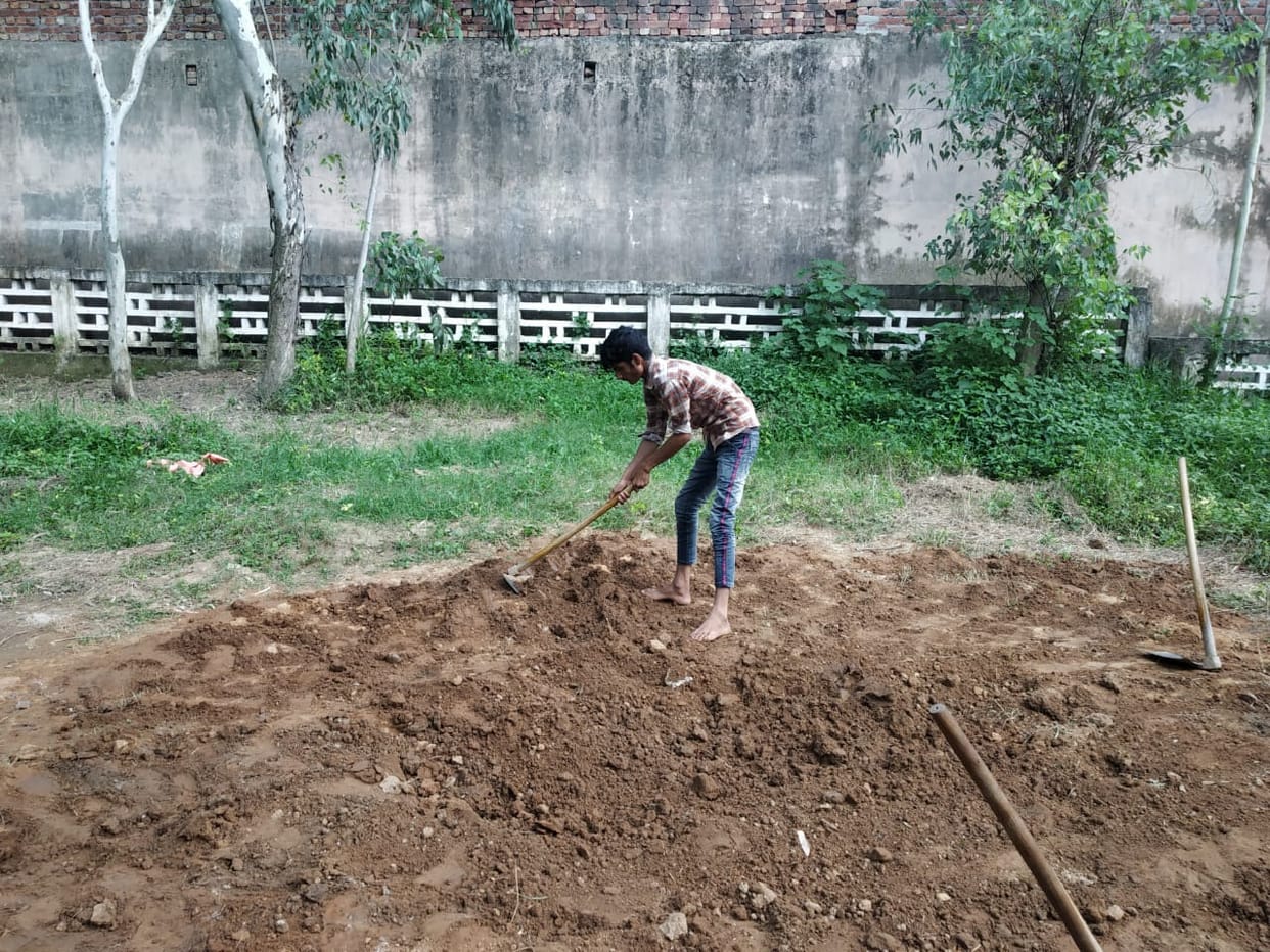 The body was removed from the tomb in the presence of officers