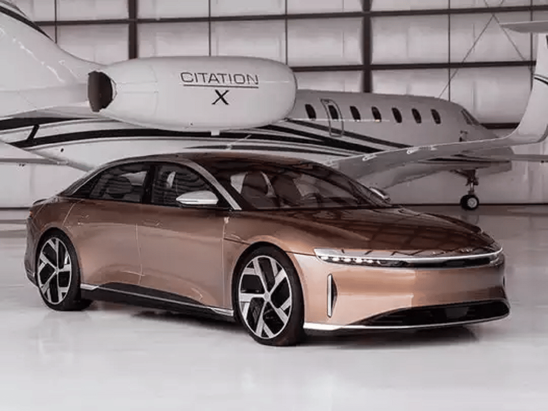 lucid air electric car launched lucid air electric sedan price longest range electric car Fastest charging electric vehicle lucid motors sedan car lucid air specs lucid air beats Tesla Model S Long Range Plus electric car in range