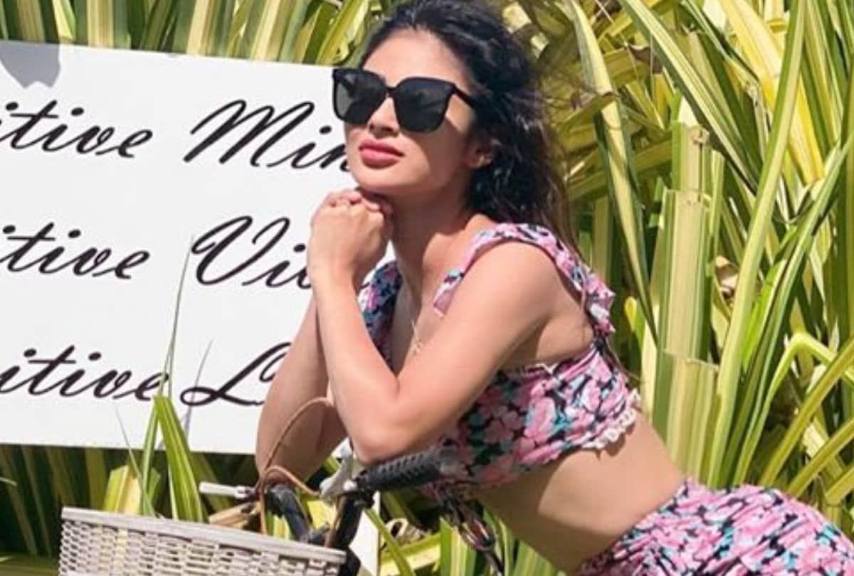 mouni roy flaunt her perfect figure in floral crop top & mini skirt