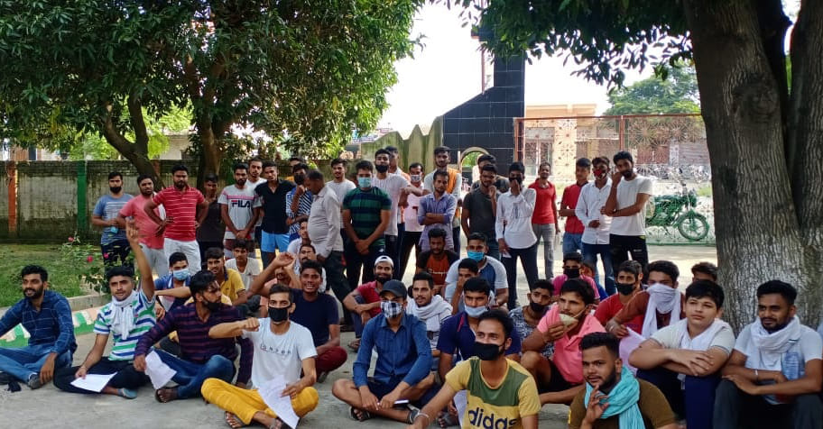Students and parents in protest against farming on the playing field