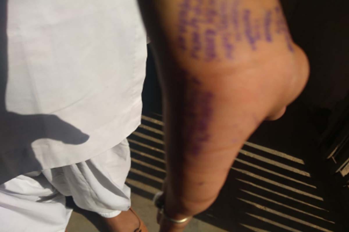 girls students caught doing Cheating in Exam by writing answers on hands feet and uniform