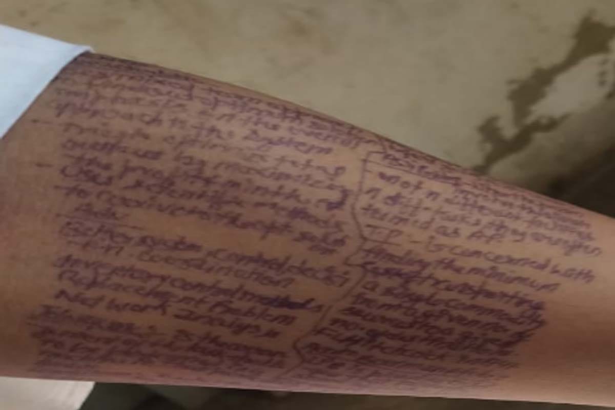 girls students caught doing Cheating in Exam by writing answers on hands feet and uniform