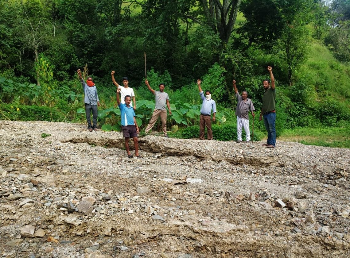 Villagers protest in debris-laden fields