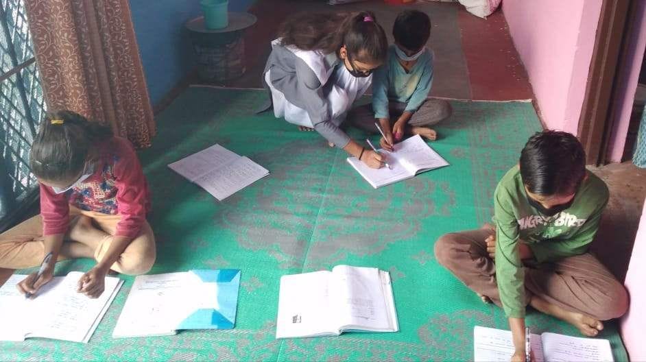 NSS students teaching children up to class VIII