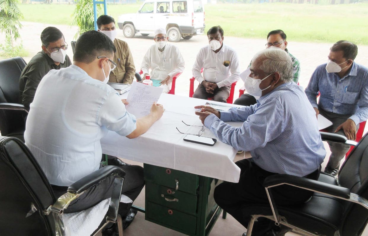 dm took a review meeting with officers to get controll over corona