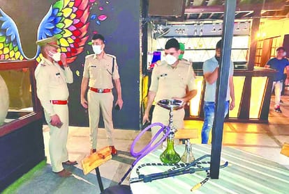 Police raid the rooftop restaurant in agra