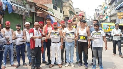 Im Mr Unemployed Placards Protest Against Samajwadi Party Workers, Asked To Remove Clothes in varanasi