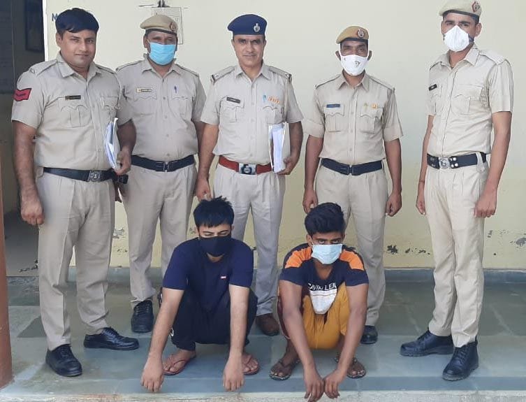 two accused of car robbery held