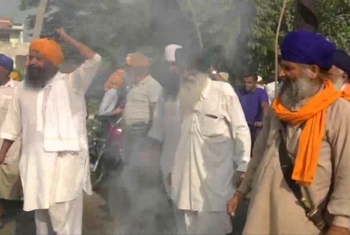 Farmers hold a protest demonstration against the Centre over agriculture ordinance