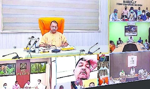 Review meeting: CM Yogi took account of development works in the division