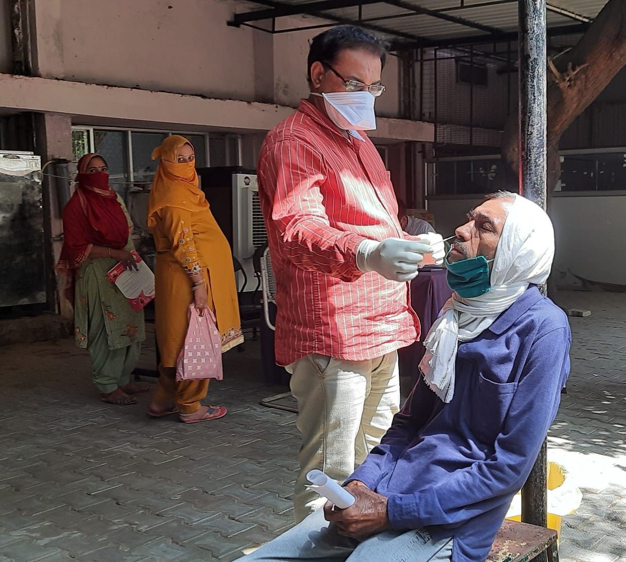 without ppe kit, health worker, corona test