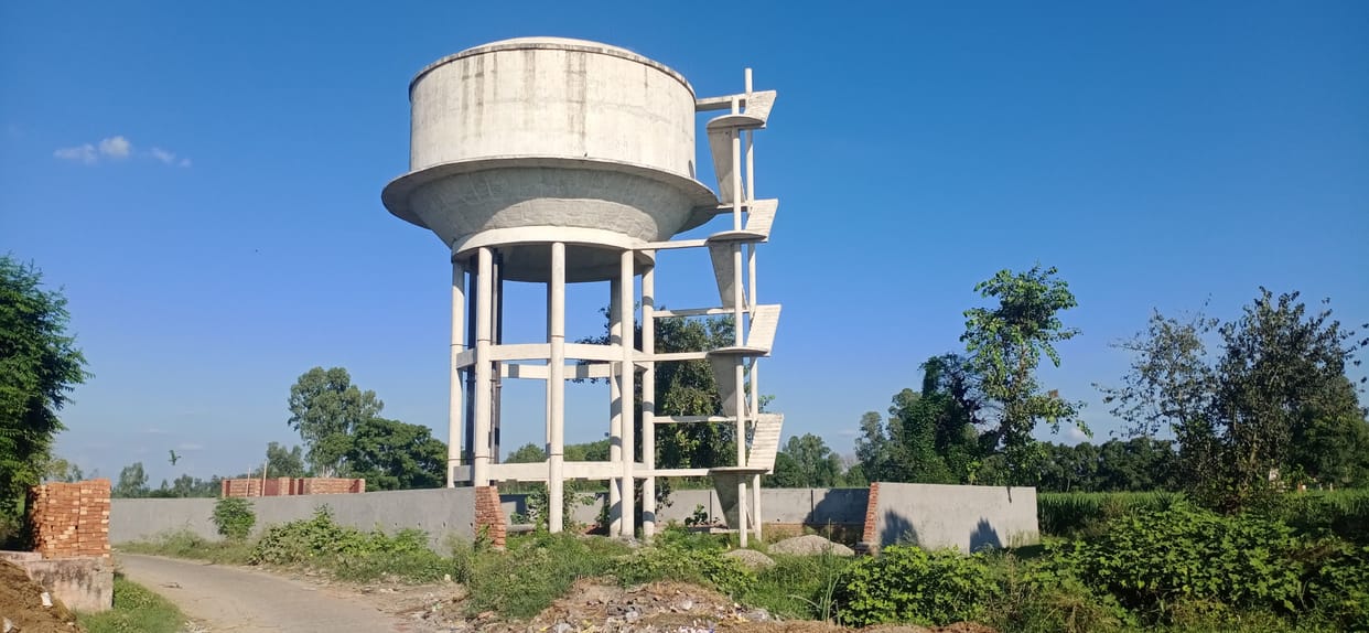 Villagers wait for clean drinking water