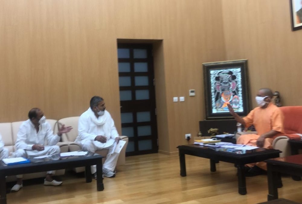 Chief Minister Yogi Adityanath meeting with Bhartiya Kiasan Union leaders in Lucknow.