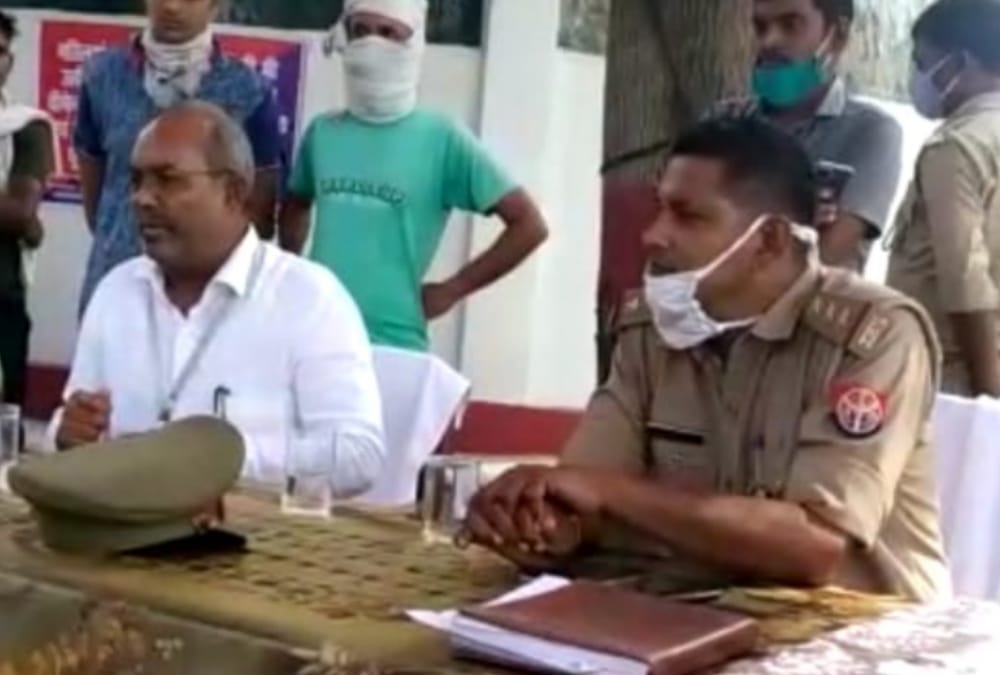 BJP MLA Dal Bahadur Kori scolded to SI for doing challan of a BJP activists bike.