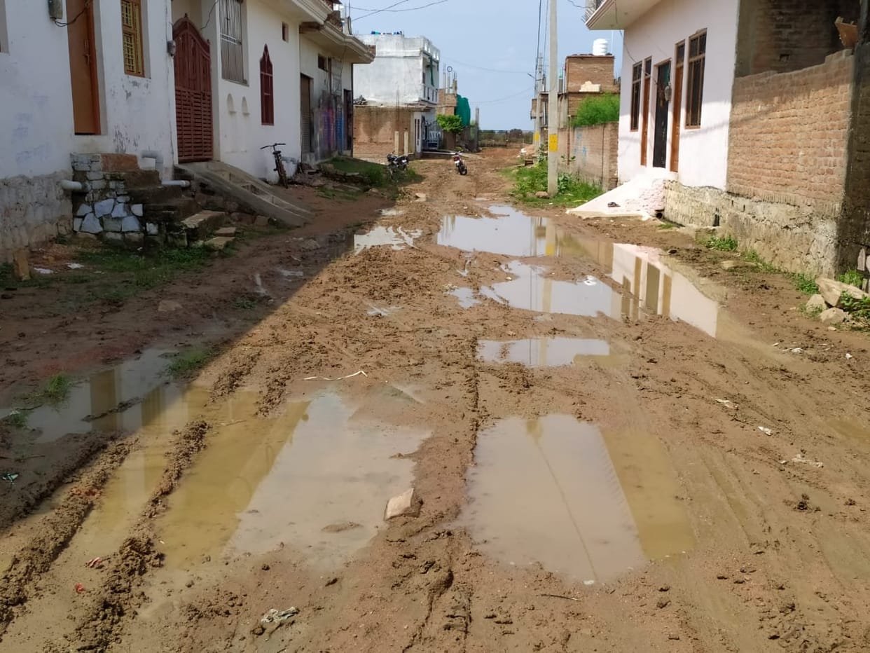 road become mud filled people disturbed