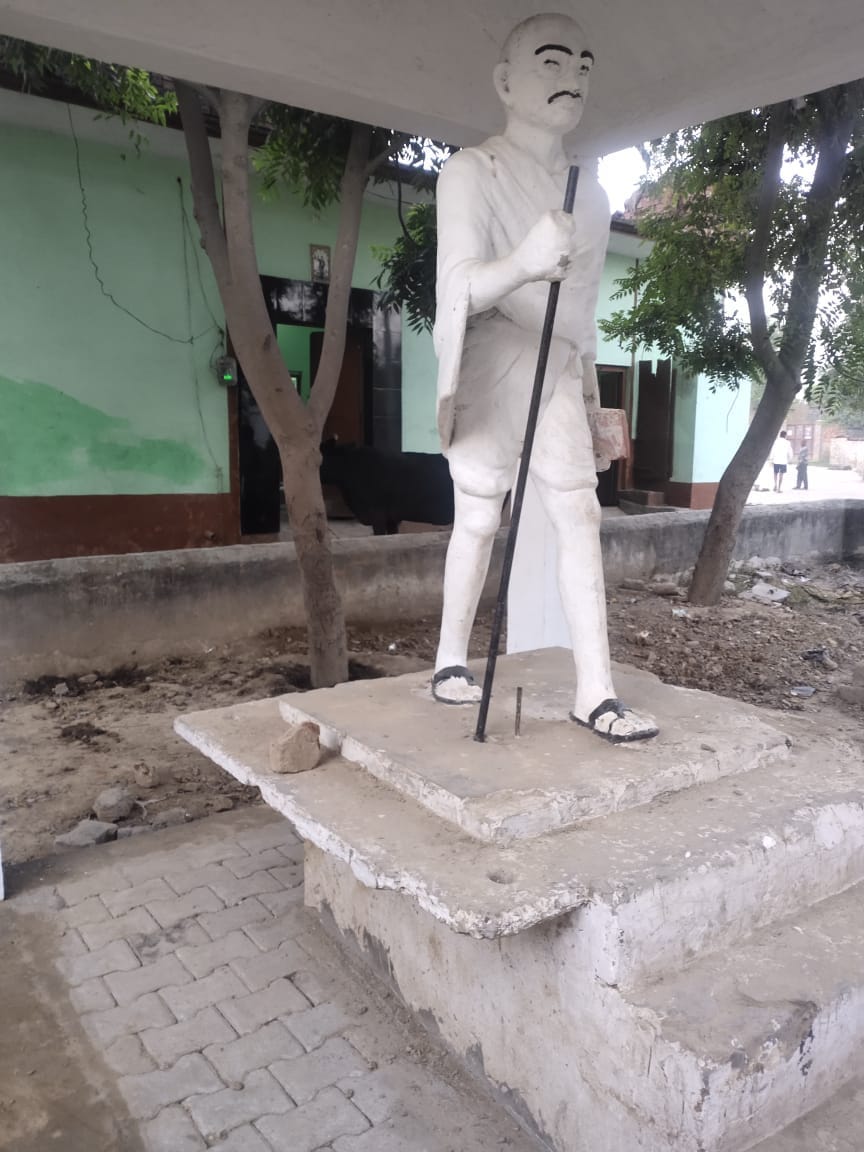 The glasses of Mahatma Gandhi's statue are also broken
