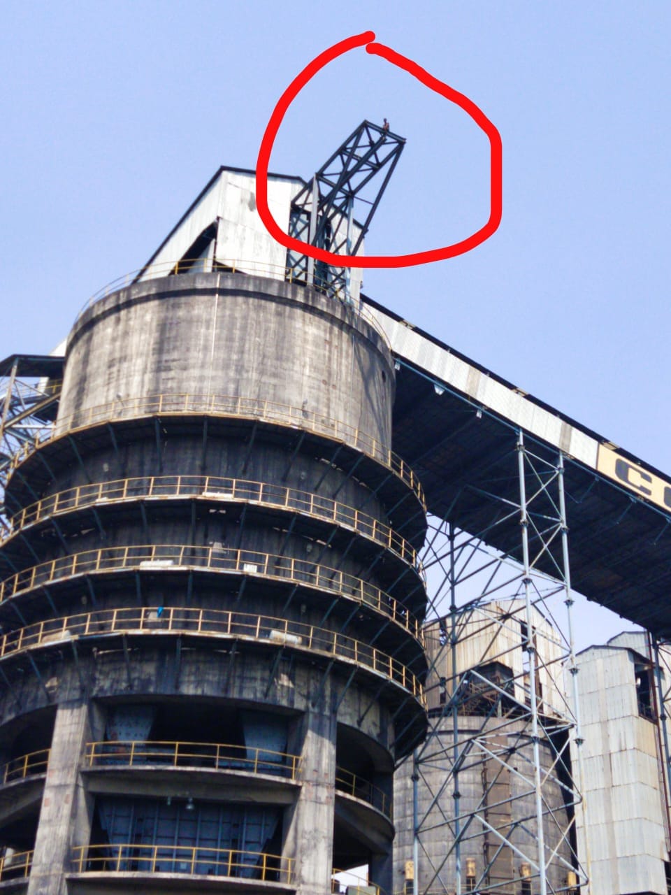 A young man climbed on the lifter for a girlfriend