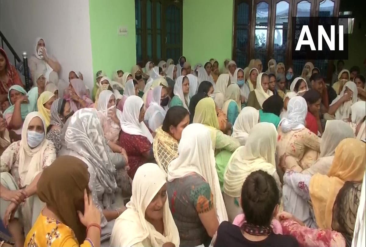 Locals chant patriotic slogans as the body of rifleman Shubham Sharma reaches his residence in Jammu