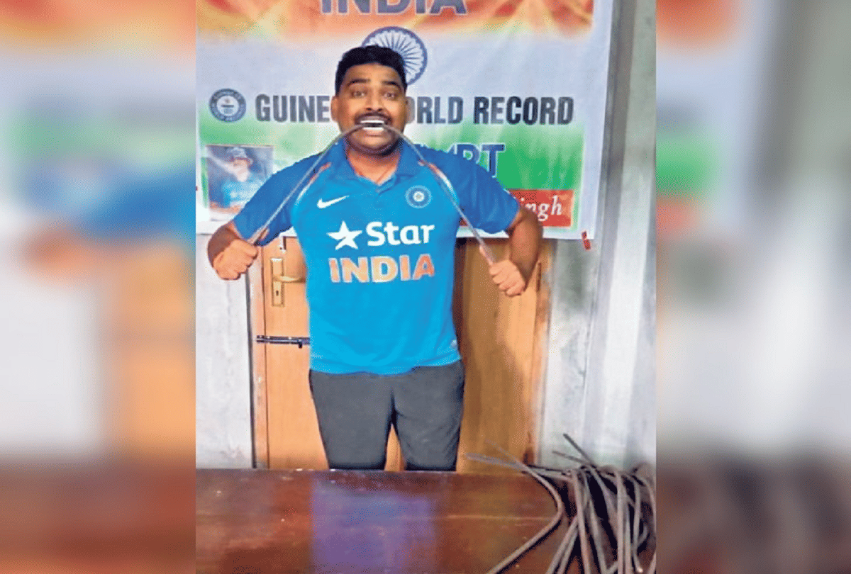 Longest distance keeping a table lifted with teeth recorded in the Guinness Book of Records