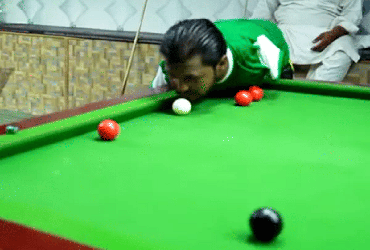 armless snooker player who use his chin for playing video goes viral