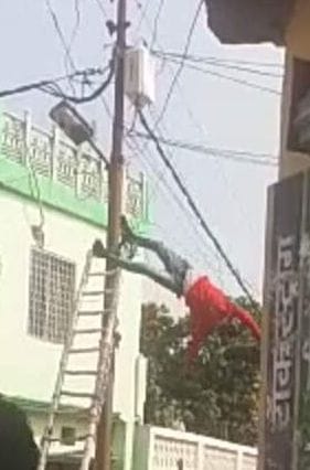 Now the electricity department worker climbed the pole