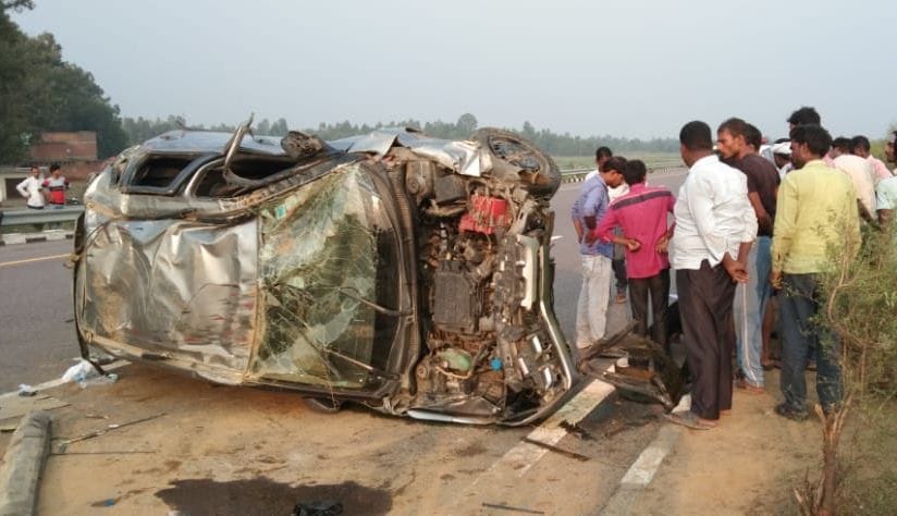 Tires burst, hit the car divider and overturned