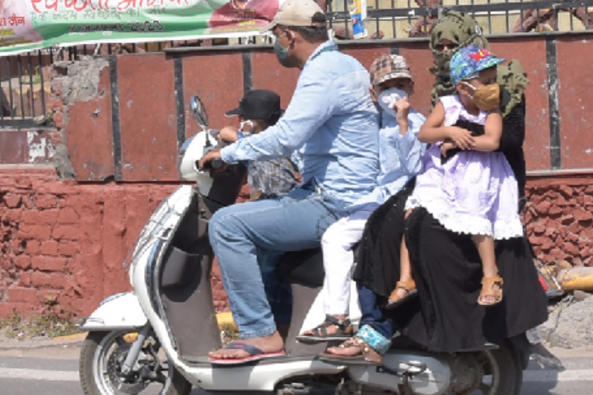 two-wheelers running without helmets  Four riders on a bike, triple riding is becoming a reason of accidents
