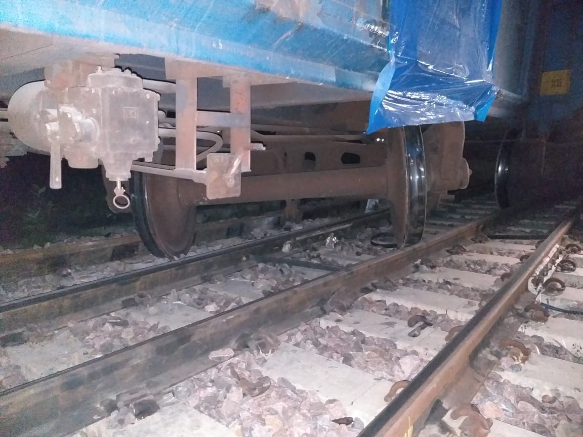 Two coaches of goods train descended from the track